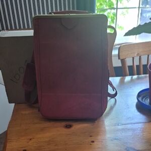RED Backpack with Modern Design and  The Bag Is Made Out Of Cork.